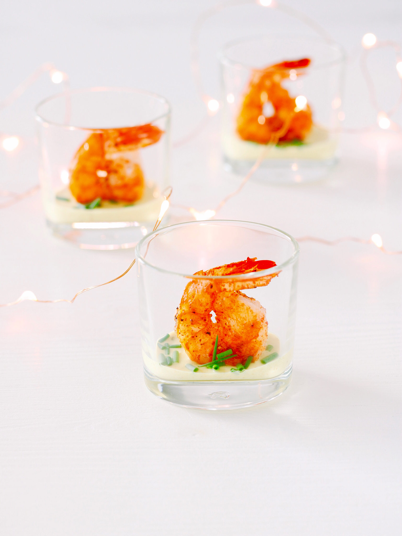 Scampi hapje met Elixir d’Anvers curry-dip